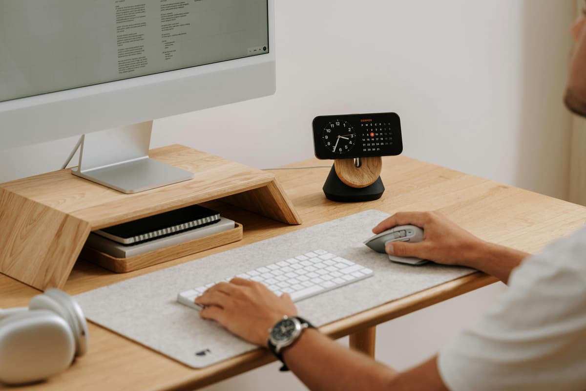 A minimalist desk setup with only a few carefully chosen accessories and clean cable routing.