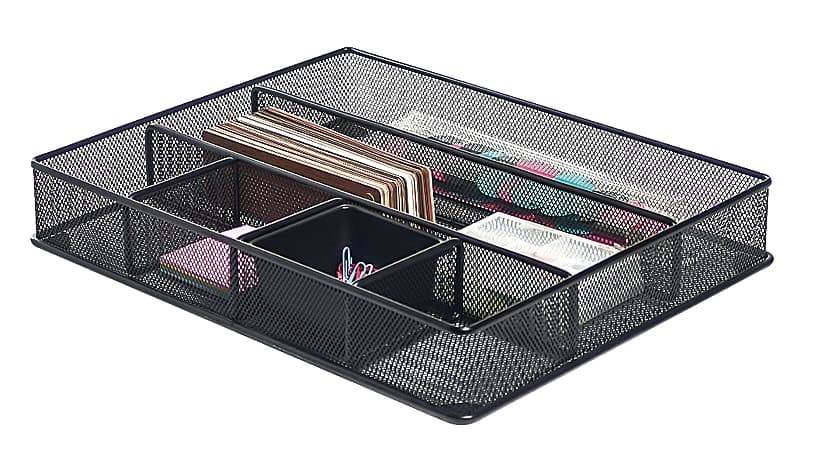 A black mesh drawer organizer tray with divided compartments holding notebooks, paper clips, and small office supplies.