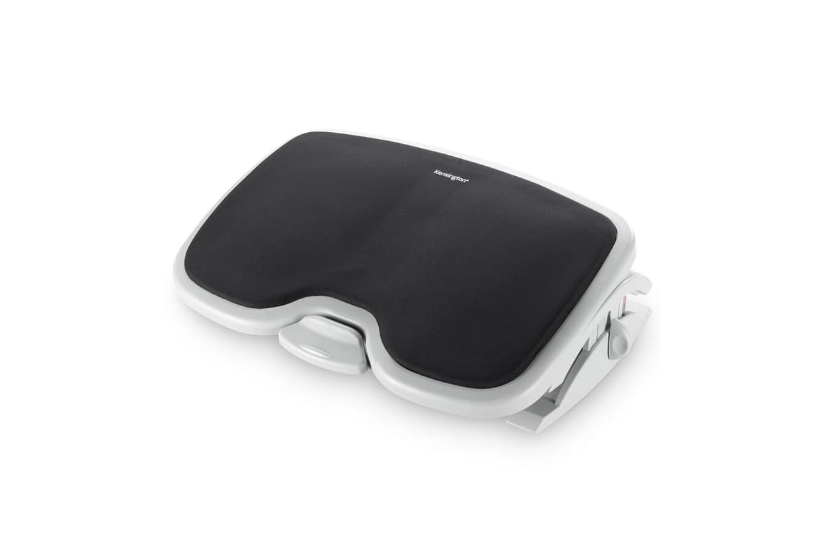 A black cushioned office footrest with a gray adjustable base viewed at an angle.