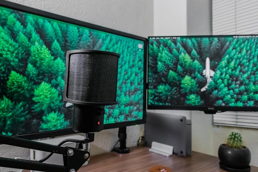 A minimalist desk setup with a monitor and desk accessories in a calm workspace.
