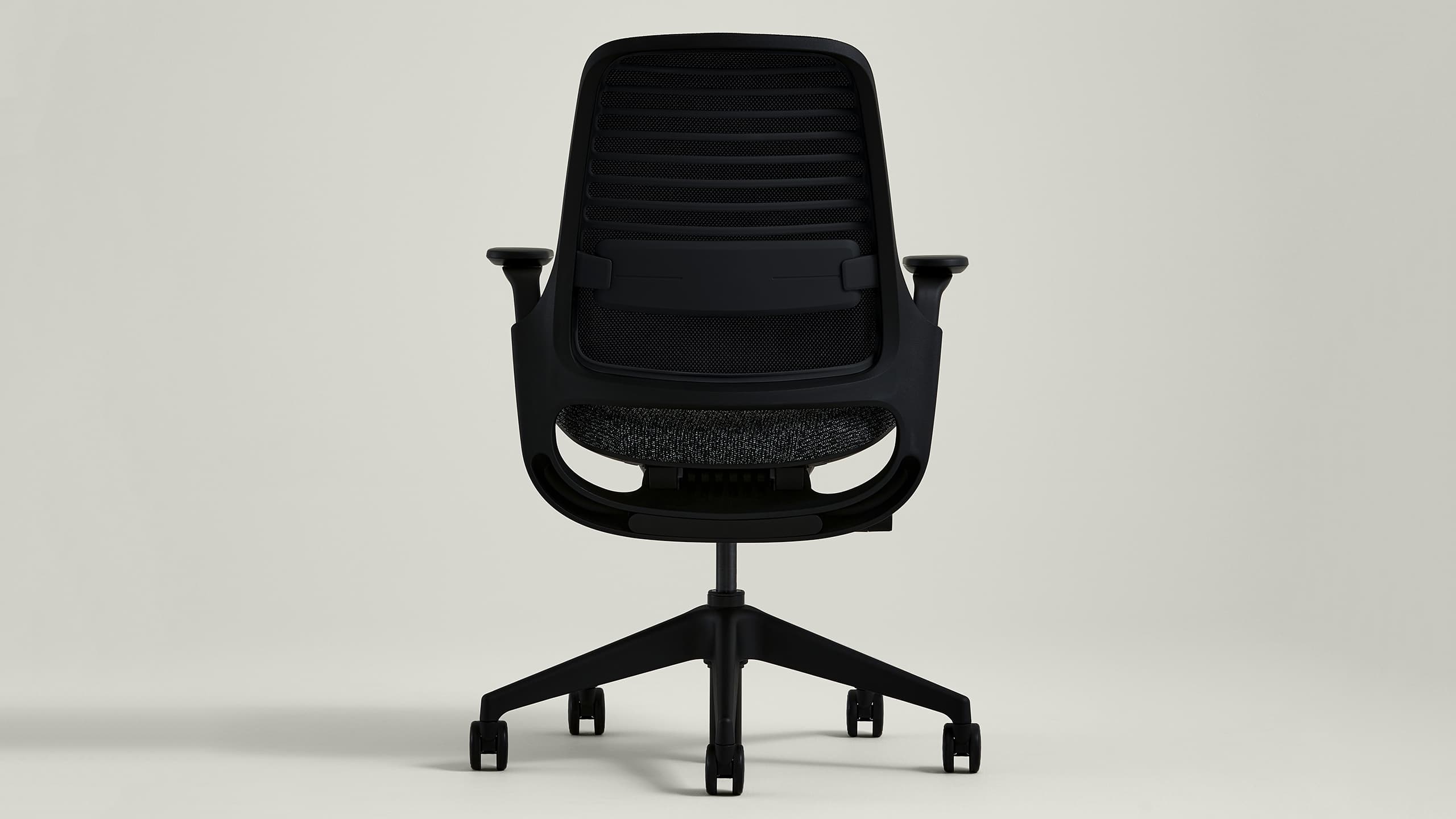 Steelcase Series 1 shown from the rear in a minimal official studio image.