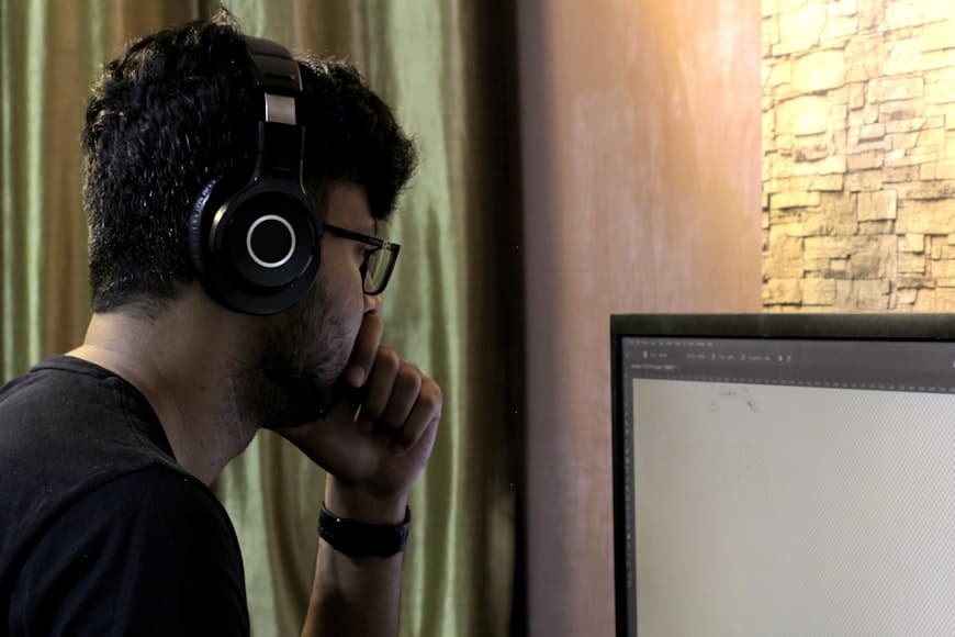 A workspace setup featuring a headset for clear calls.