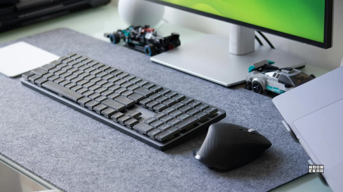 A wireless keyboard on a desk, representing wake-delay and missed first-key behavior after sleep.