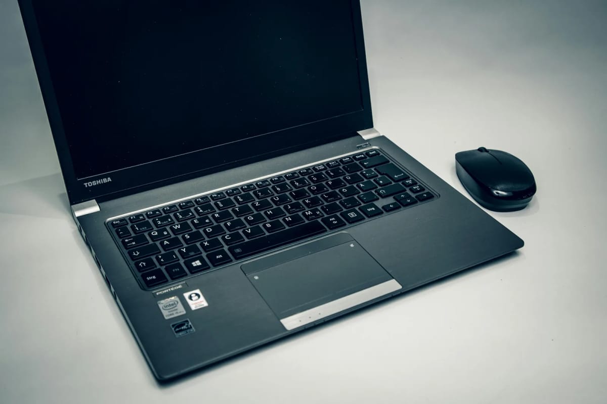 A close view of a laptop keyboard, representing real-world keyboard failure and replacement decisions.