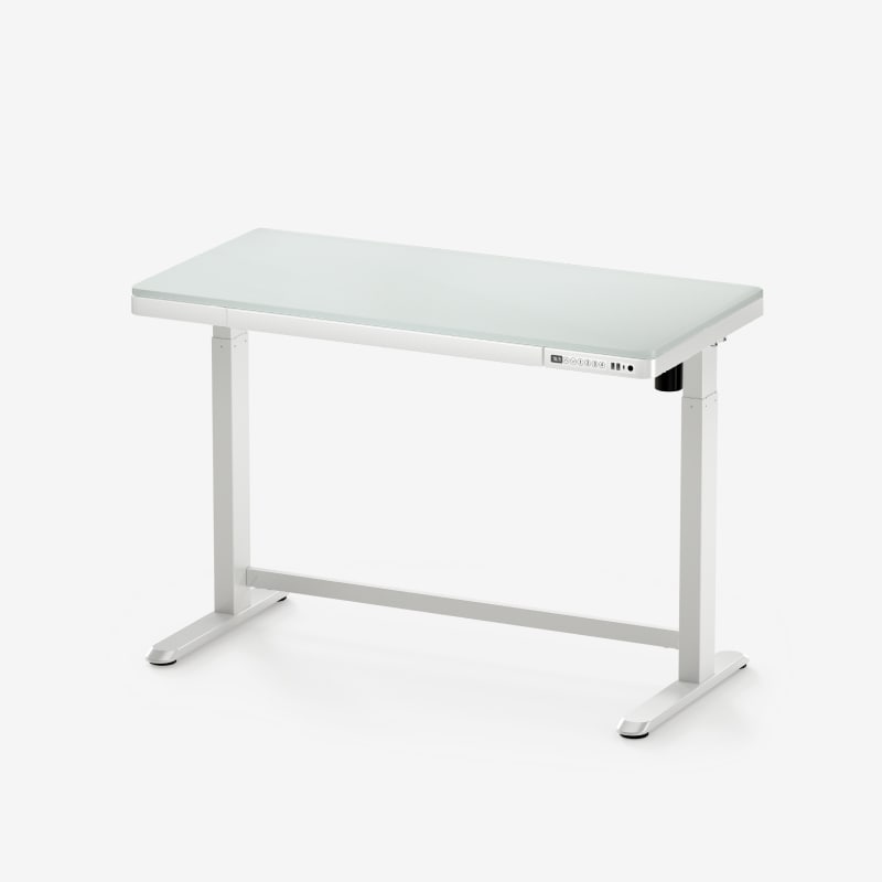 FlexiSpot Comhar standing desk with its compact top and integrated drawer.